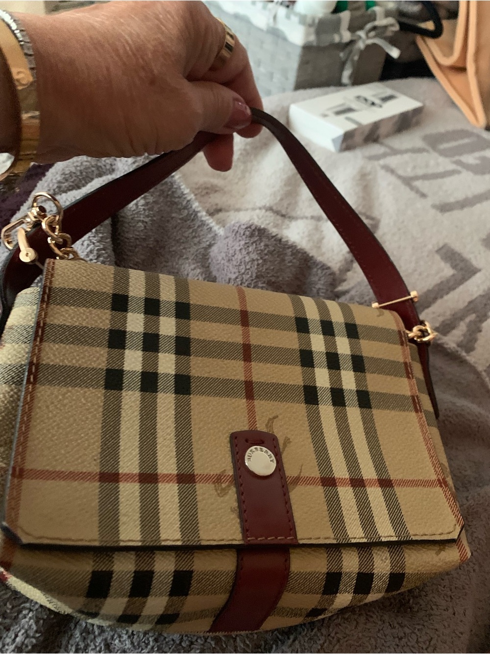Burberry Tan Nova Check Baguette flap / faux pearl strap inc
Sm zipper pocket